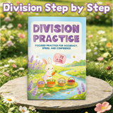 Printed elementary division workbook with step-by-step practice