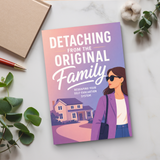 Desk flat-lay with Detaching from the Original Family paperback