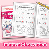 Children practicing multiplication equations with bubbles