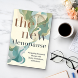 Study desk flat-lay with women's wellness guide