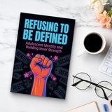 Study desk flat-lay with teen identity and inner strength book