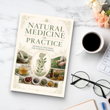 Workspace photo of herbal wellness and natural care reference book
