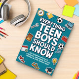 Study desk flat-lay with teen boys life skills guide