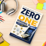 Study desk flat-lay with Zero to One Personal IP guide