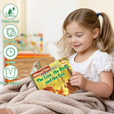 Child reading The Lion, the Bear, and the Fox English-Spanish book
