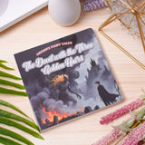 Flat-lay photo of The Devil with the Three Golden Hairs picture book