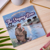 Flat-lay photo of The Singing Bone picture book on a table