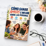 Cómo ganar amigos e influir sobre las personas - paperback beside a cup