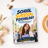 School Survival Psychology - paperback beside writing materials